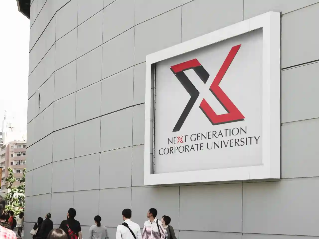 Panoramic view of the Next Generation University campus with snowy mountains in the background.